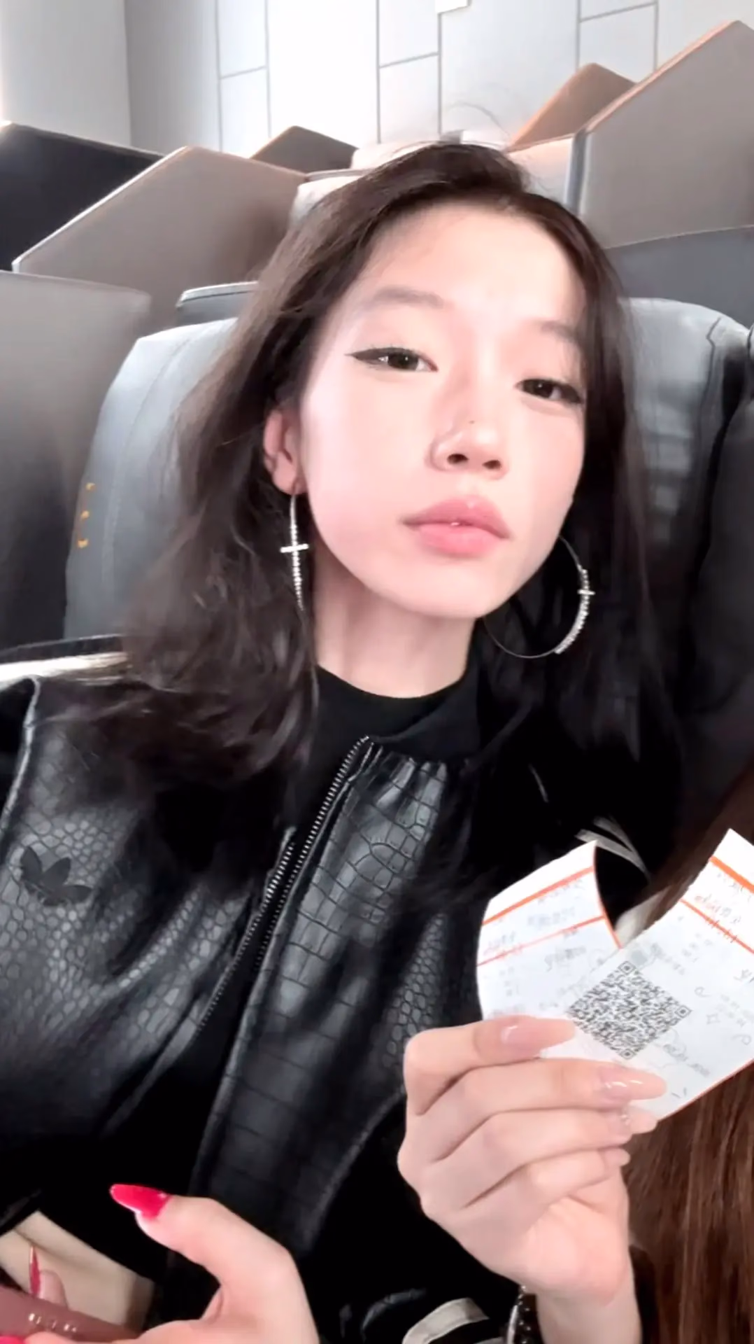 A woman with an aloof yet relaxed vibe